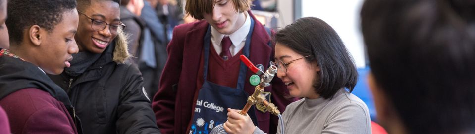 Students participating in an experiment with a tutor.