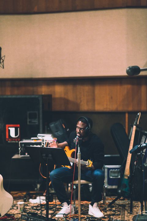 musician derrick hodge playing guitar