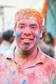 Faces smeared with Holi colours