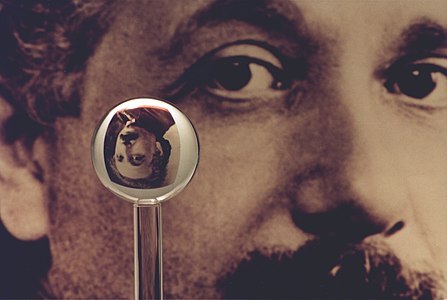 An image of one of the most accurate human-made spheres, as it refracts the image of Einstein in the background. This sphere was a fused quartz gyroscope for the Gravity Probe B experiment, and differs in shape from a perfect sphere by no more than 40 atoms (less than 10 nm) of thickness. It was announced on 1 July 2008 that Australian scientists had created even more nearly perfect spheres, accurate to 0.3 nm, as part of an international hunt to find a new global standard kilogram.[19]