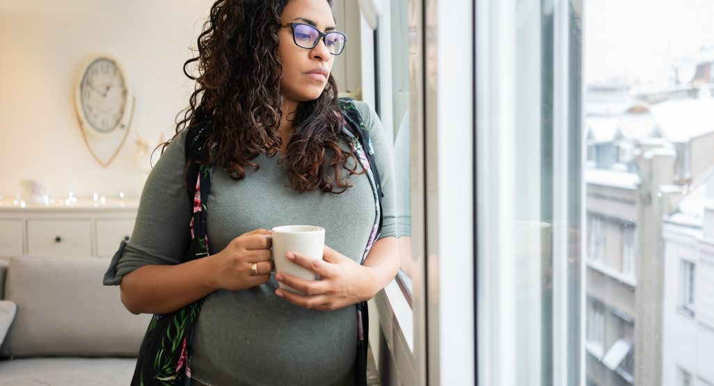 Pregnant woman looking concerned