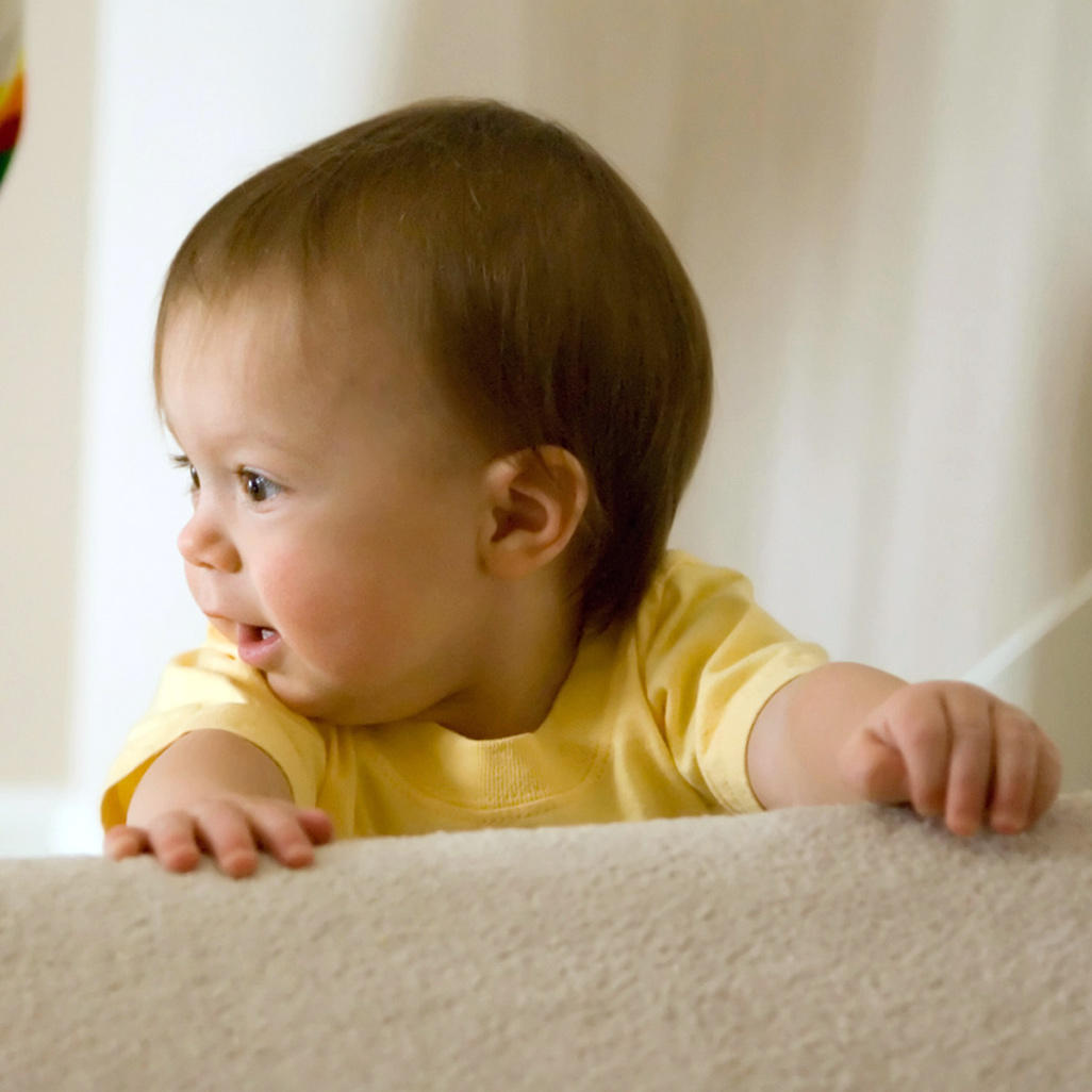 Toddler trying to climb the stairs