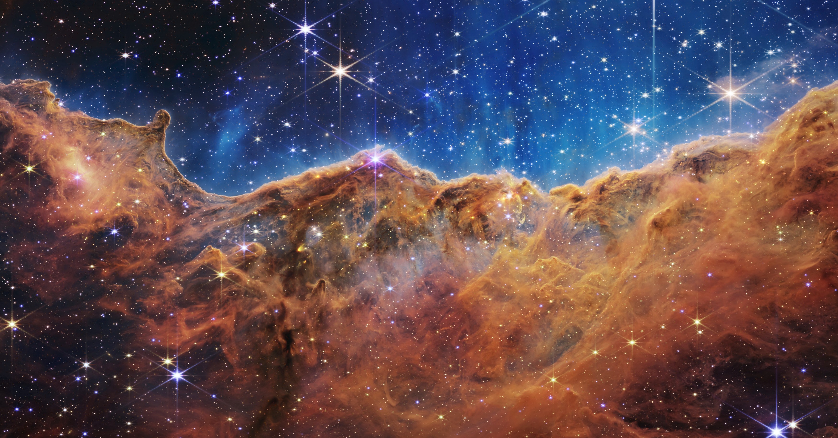 📷 🔭  “Cosmic Cliffs” in the Carina Nebula from NASA’s James Webb Space Telescope (CC0 1.0)