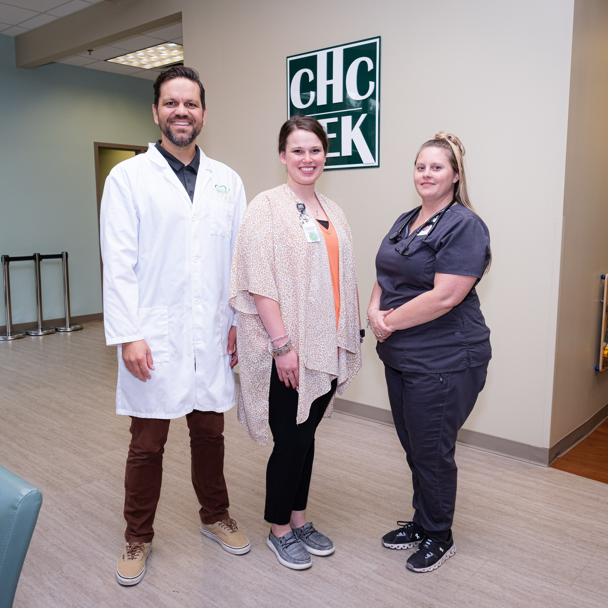 Three NHSC clinicians at the Community Health Center of Southeast Kansas pose for a photo