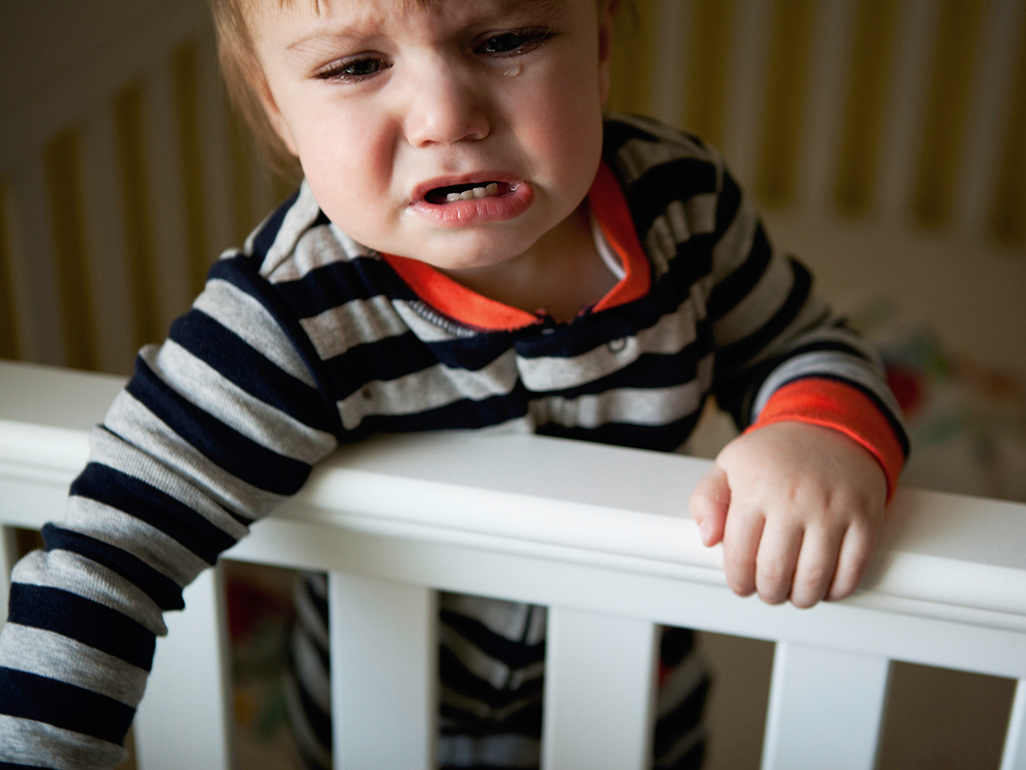 toddler crying in crib