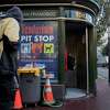 A man enters the 24-hour Pit Stop restroom on the corner of Eddy and Jones streets in the Tenderloin district of San Francisco.