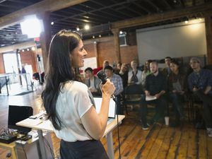 Woman speaking to a crowd