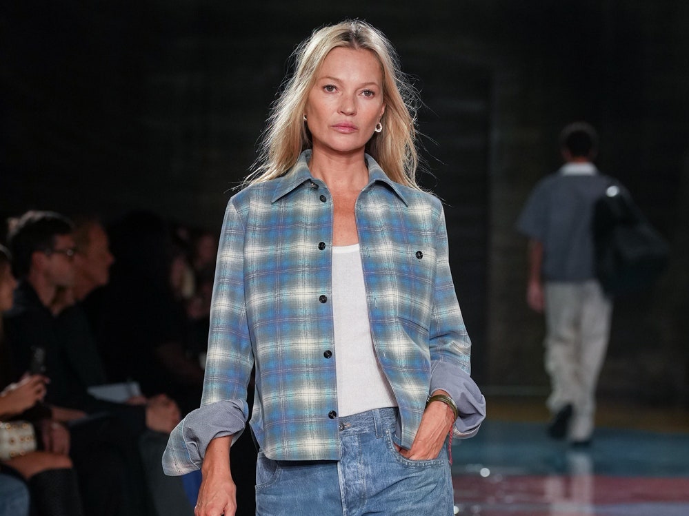 Image may contain Kate Moss Human Person Clothing Denim Jeans Apparel Pants Fashion and Runway