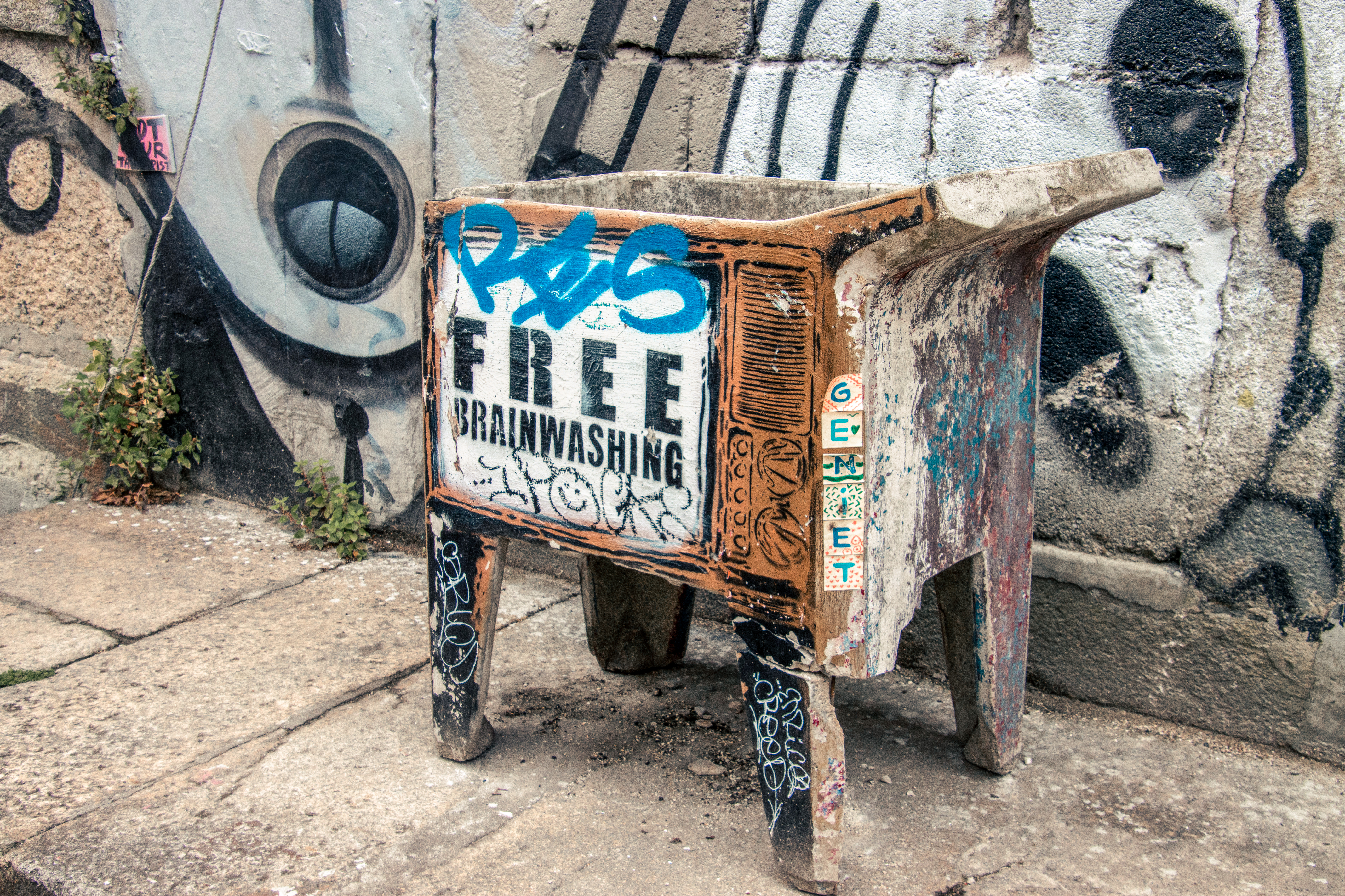 Old wash basin with satirical propaganda message