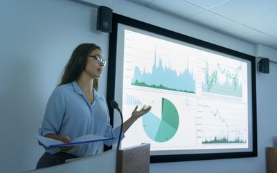 woman giving a powerpoint presentation