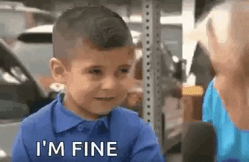 Child wearing blue shirt saying “I’m fine” and crying