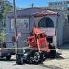 A construction front loader crashed into a home on San Bruno Ave.