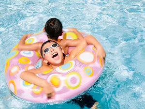 Kids swimming in pool