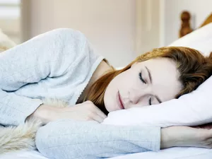 Woman asleep in bed