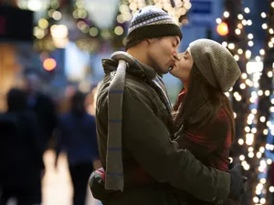 Couple kissing at night