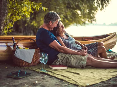 Couple having picnic on beach