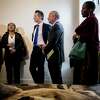 California Governor Gavin Newsom (center) and Sacramento Mayor Darrell Steinberg (second from right) meet tour rooms at the the Henry Robinson Multi-Service Center before a press conference announcing a newly created state-level homeless commission alongside Oakland Mayor Libby Schaaf and other Alameda County and state officials in Oakland in 2019.