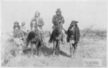 Image 38"Geronimo's camp before surrender to General Crook, March 27, 1886: Geronimo and Natches mounted; Geronimo's son (Perico) standing at his side holding baby." By C. S. Fly. (from Photojournalism)