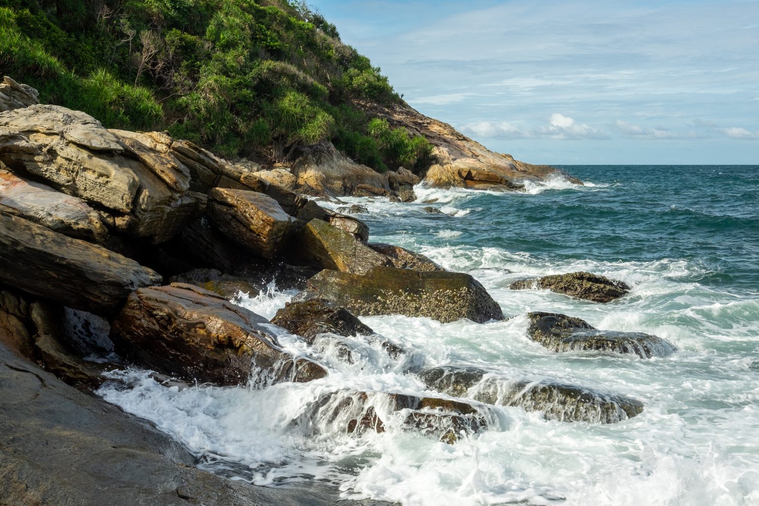 Rocky coast with gently crashing waves. Koh Samet Island, Thailand. Photo contributed by Roy Tanck to the WordPress Photo Directory.