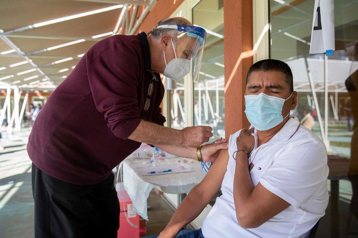 Person getting COVID vaccine