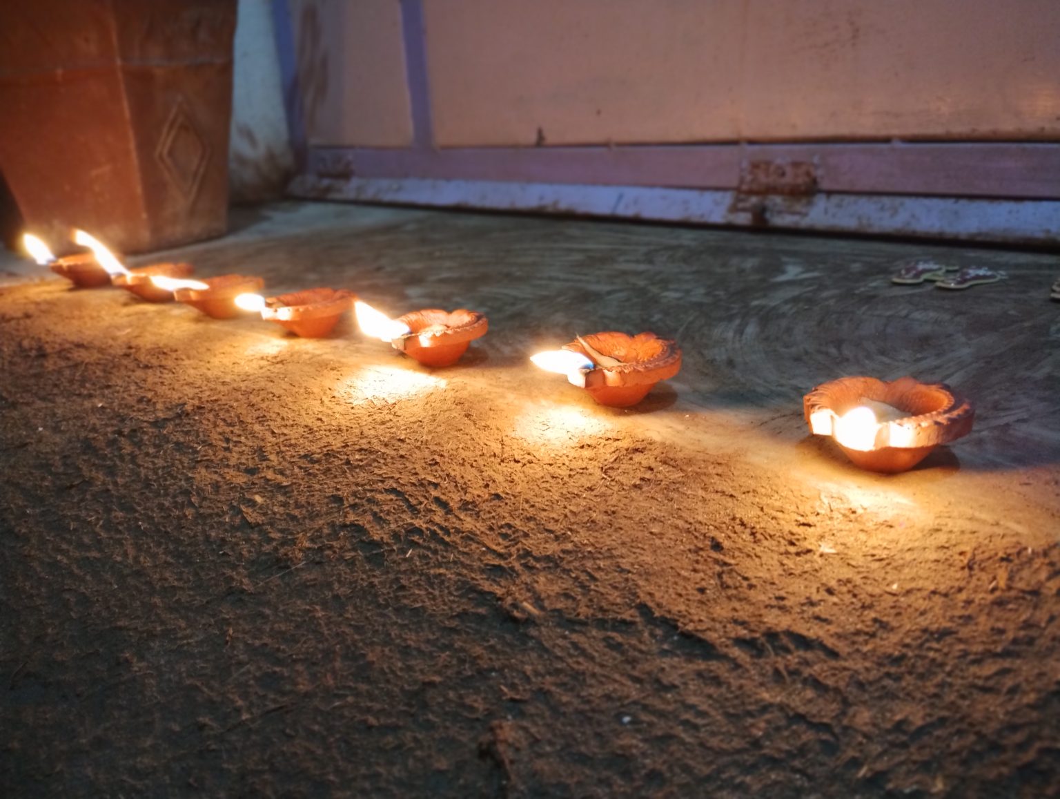 Diwali Diya (earthen lamps) in a row. Photo contributed by Ronak J Vanpariya to the WordPress Photo Directory. 