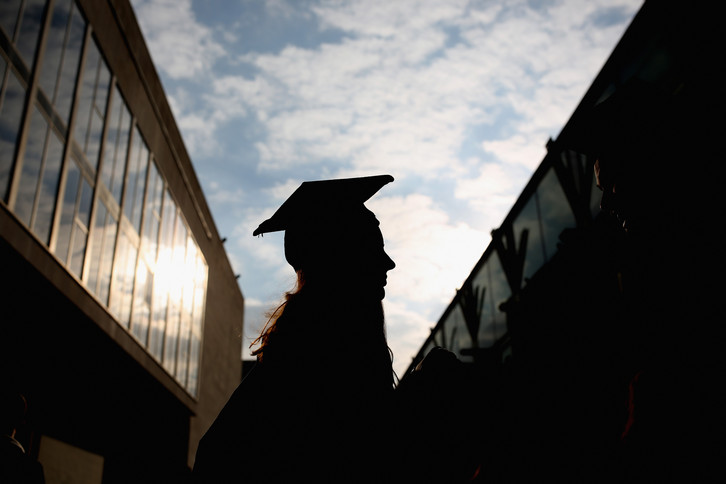 Students arrive for their graduation ceremony.