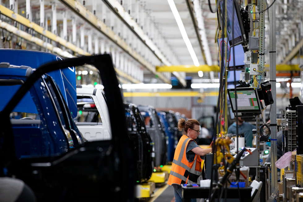 women working in automotive factory in Michigan