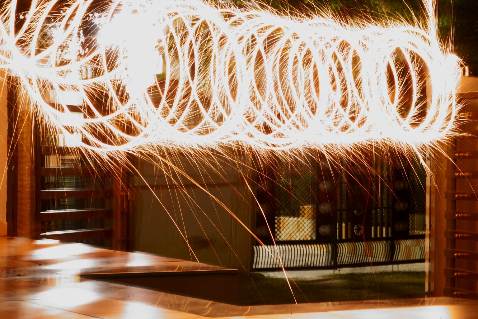 Long exposure photograph with circular light trails taken at Diwali fireworks. Photo contributed by isuchitpatel to the WordPress Photo Directory