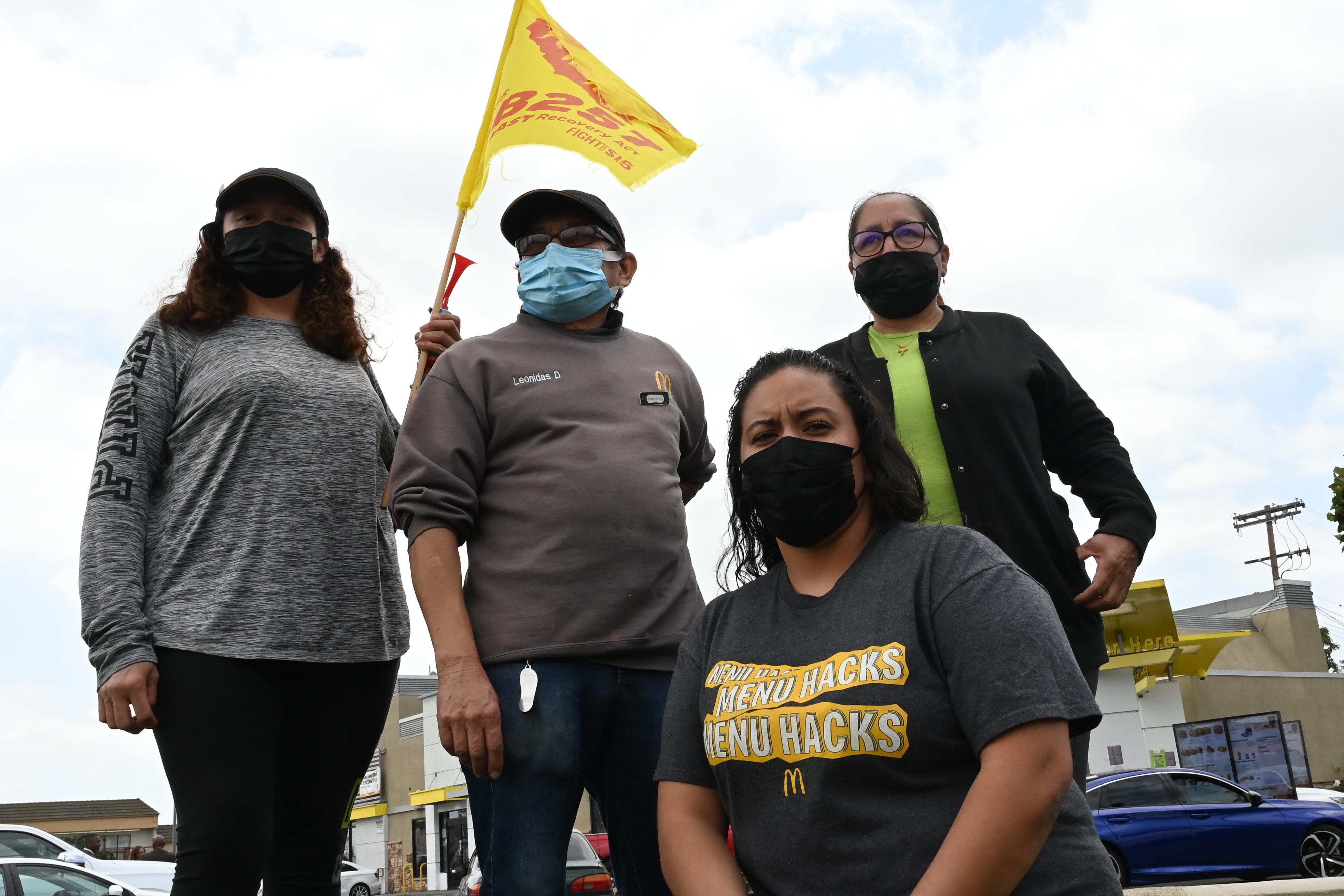 McDonald's workers on strike, with masks on! The rest of the pictures are just various low-wage workers and supporters with the same.