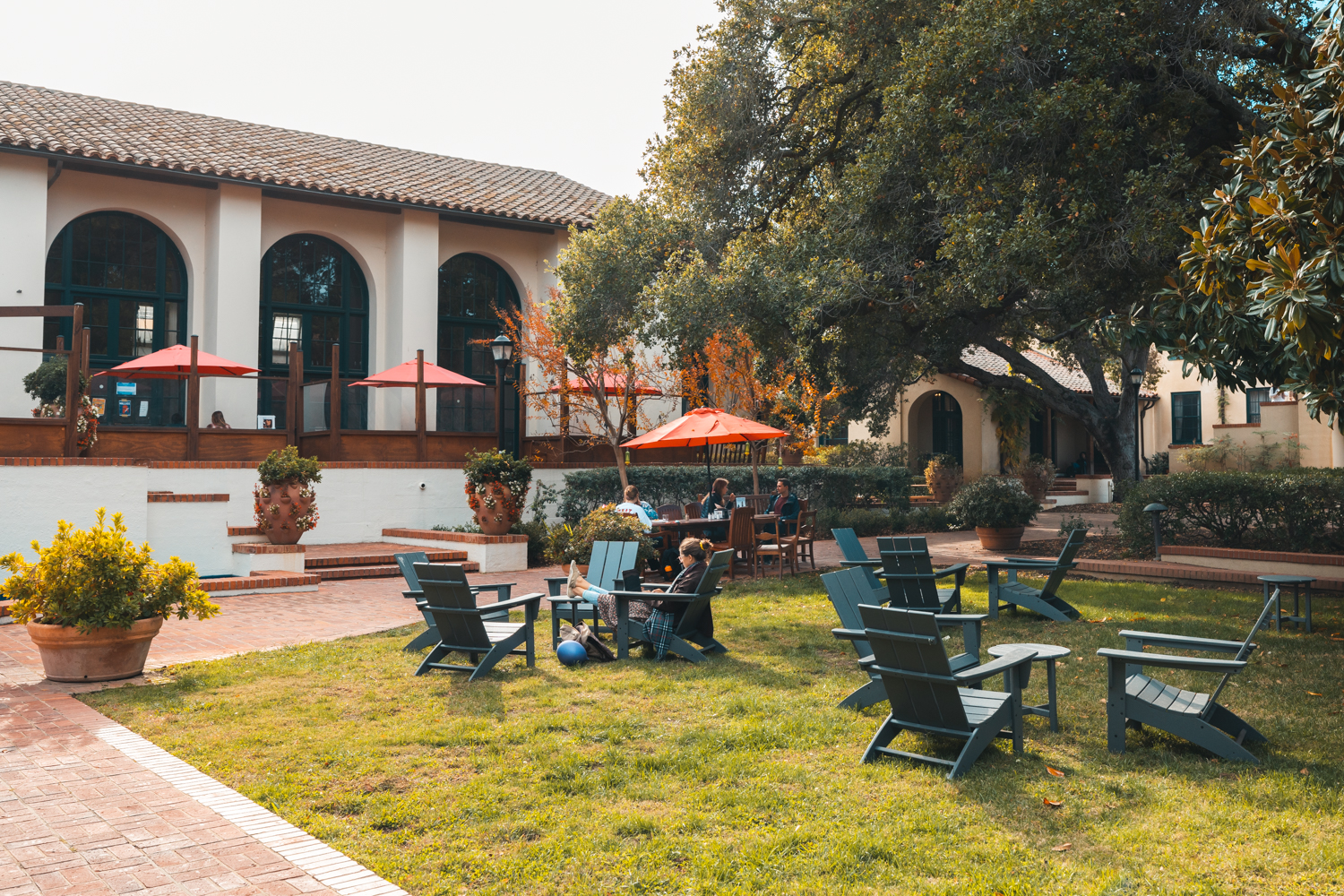 Members of the community enjoy a break in Lagunita Court