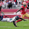 San Francisco 49ers wide receiver Deebo Samuel (19) runs against Seattle Seahawks cornerback Mike Jackson (30) during the first half of an NFL wild card playoff football game in Santa Clara, Calif., Saturday, Jan. 14, 2023.