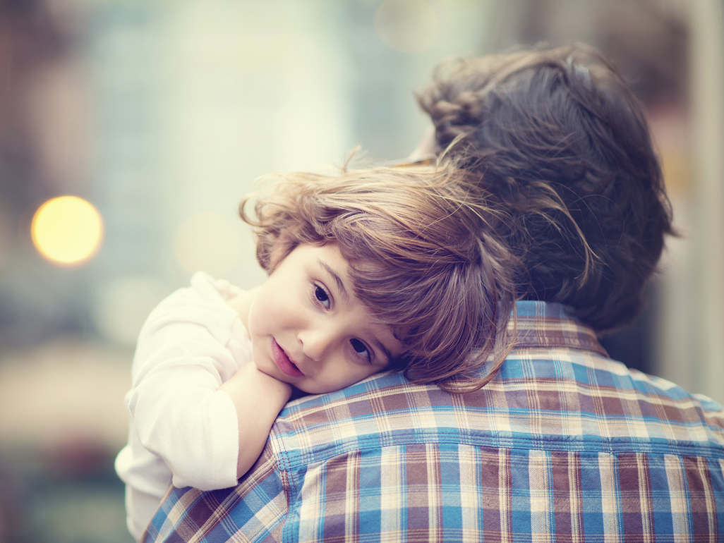 toddler on father's shoulder