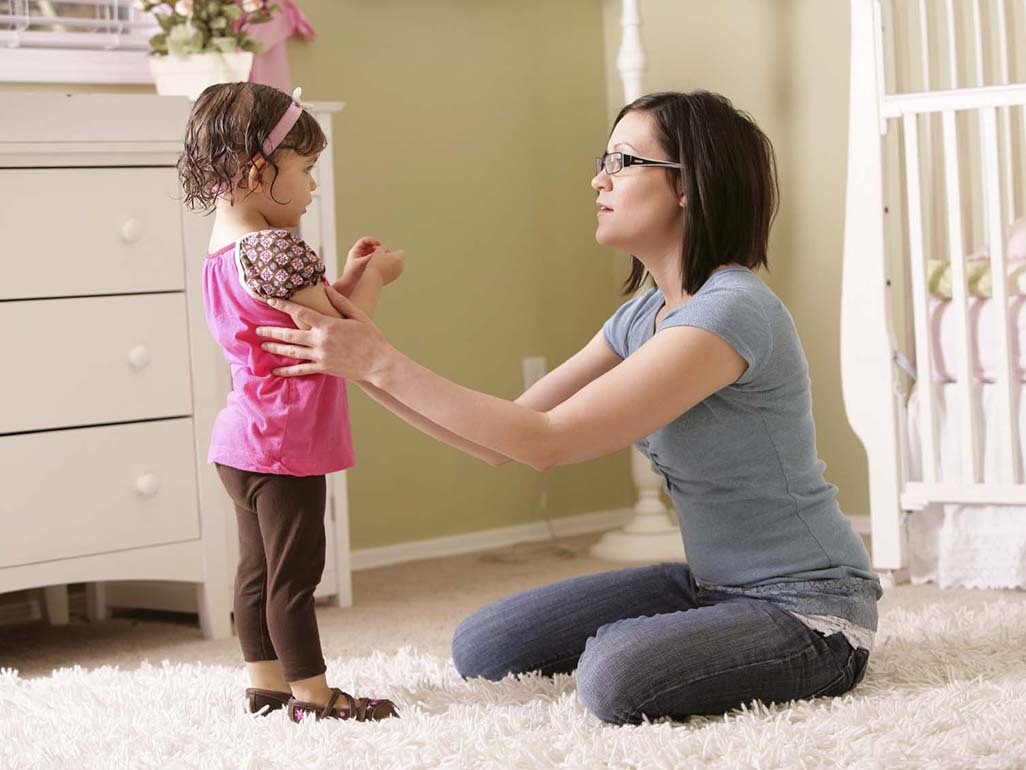 mother talking to her toddler