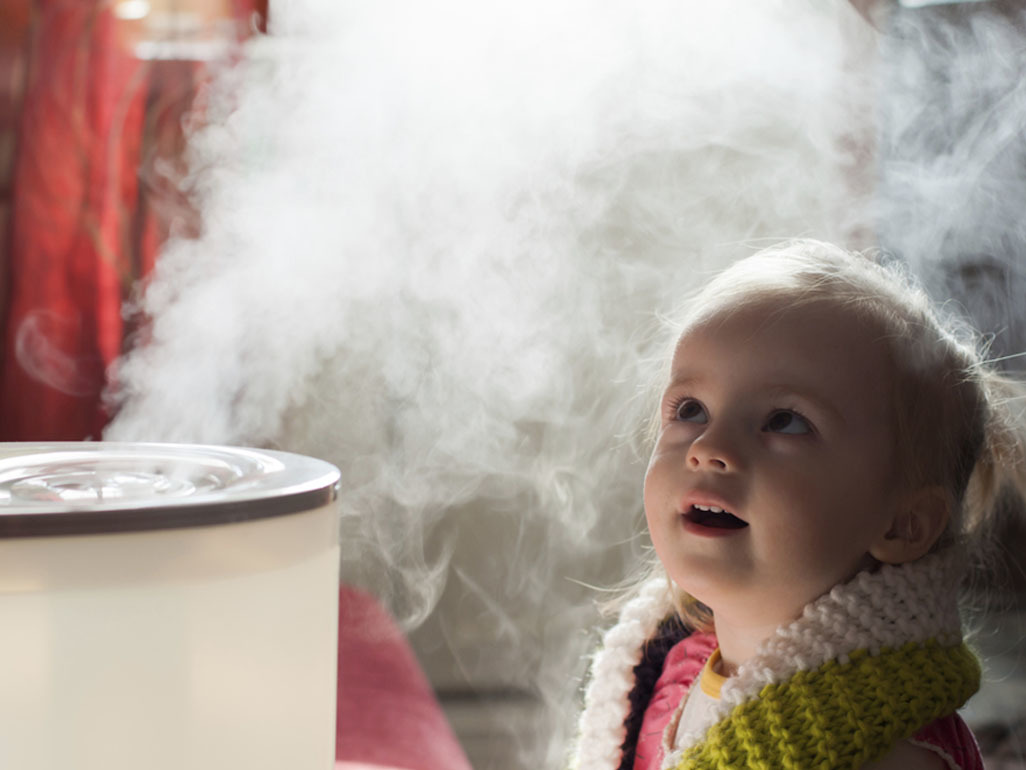 baby sitting with vaporizer