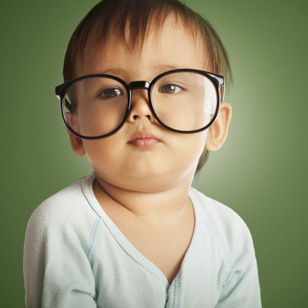 toddler wearing big glasses