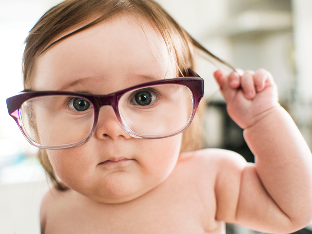 cute baby wearing glasses