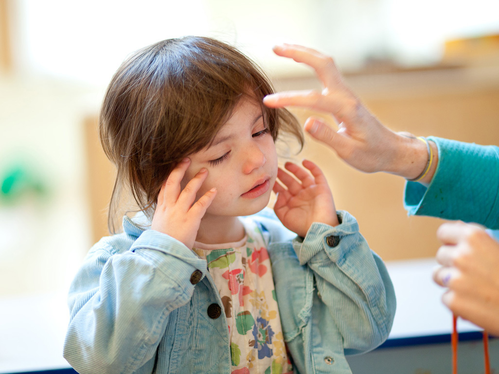 child with swollen and red eyes