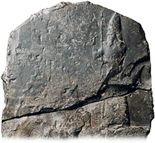 Stone tablet with image of Nebuchadnezzar and a temple