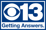 A white CBS eye next to a white 13 in a thick sans serif in a blue box. The box is encased in a white box, which at the bottom has the station's slogan, "Getting Answers.", on it. The white box is trimmed in blue.