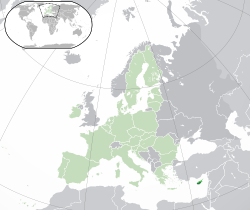 Location of Cyprus (pictured lower right), showing the Republic of Cyprus in darker green and disputed territory shown in brighter green, with the rest of the European Union shown in faded green