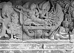 Ravana kidnapping Sita while Jatayu on the left tried to help her. 9th-century Prambanan bas-relief, Java, Indonesia.