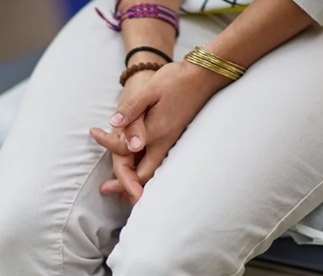 Close up of woman crossed hands