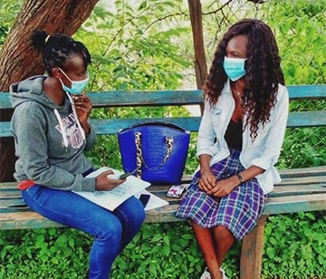 A woman researcher conducting an interview for a multi-country study on FGM, Kenya