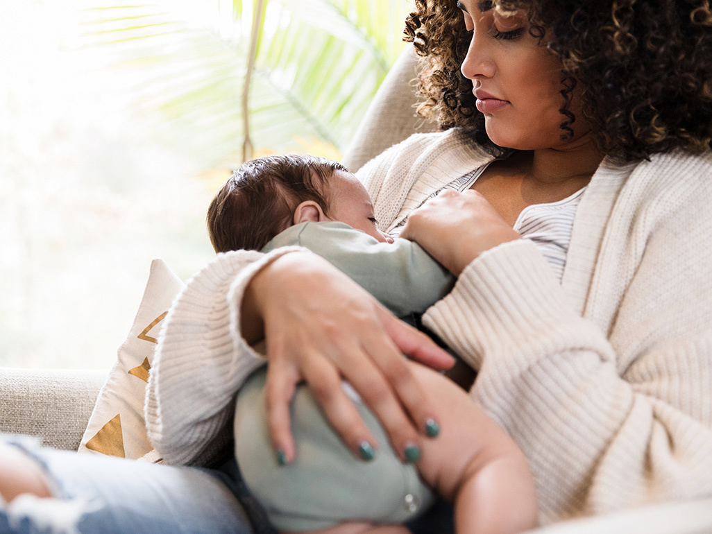 Mother breastfeeding her baby