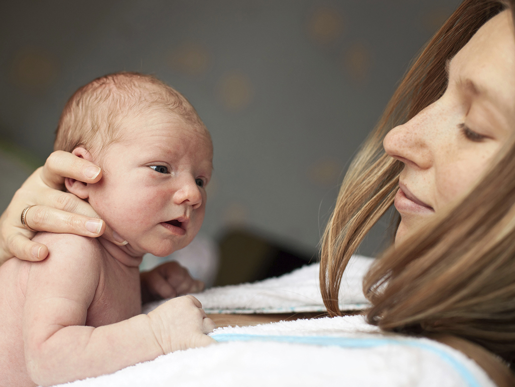 Mum holding baby to chest