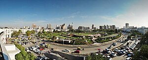 A view of a road at Connaught Place showing busy traffic