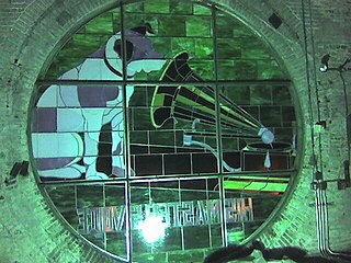 One of 4 Nipper stained glass windows seen from inside the "Nipper Tower" in the old RCA Victor Building 17.[74]