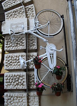 Bike with flower pots, Arco, Italy