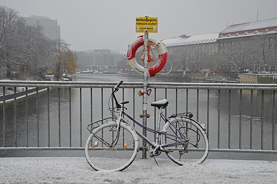 Snow-covered bicycle in Berlin