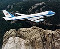 Image 4Air Force One, a Boeing VC-25, flying over Mount Rushmore. Boeing is a major aerospace and defense corporation, originally founded by William E. Boeing in Seattle, Washington.